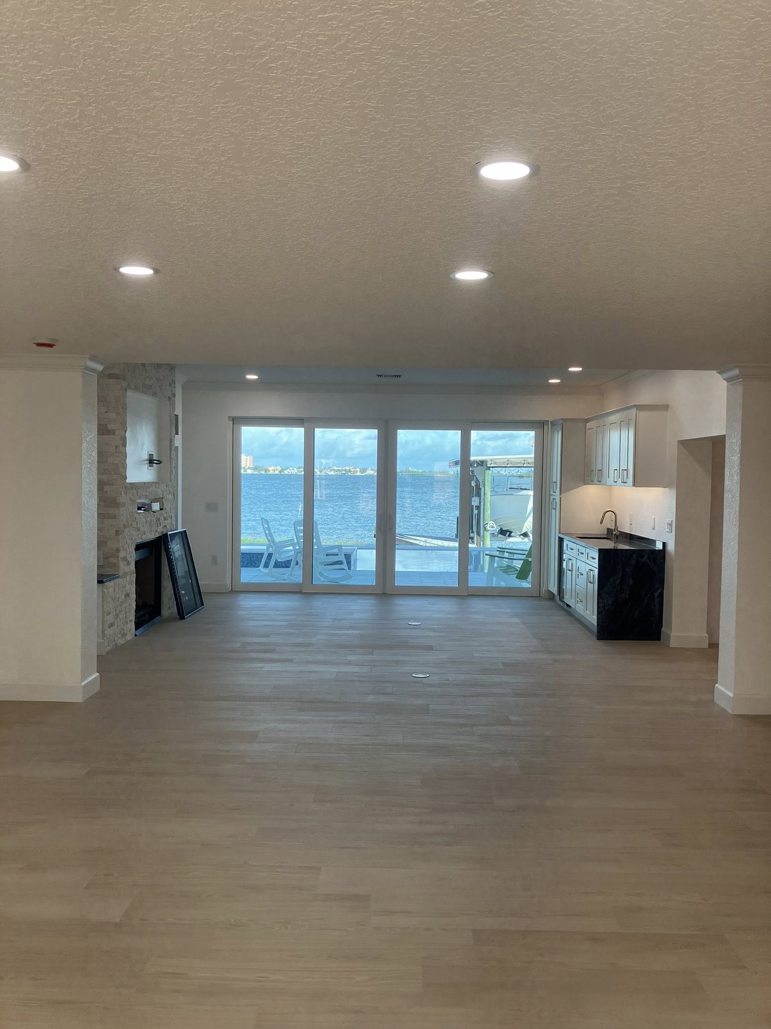 Completed custom home interior with waterfront views