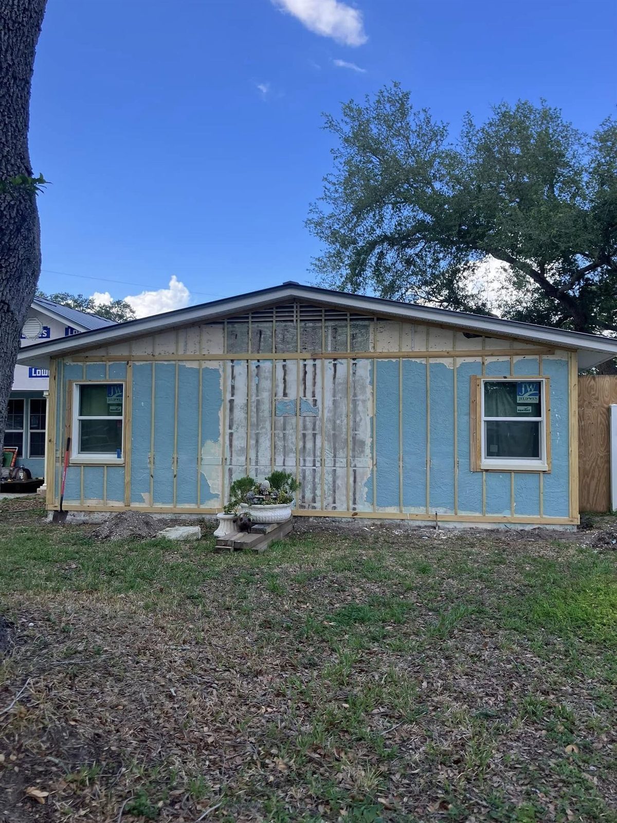 Framing and exterior prep around newly installed impact windows